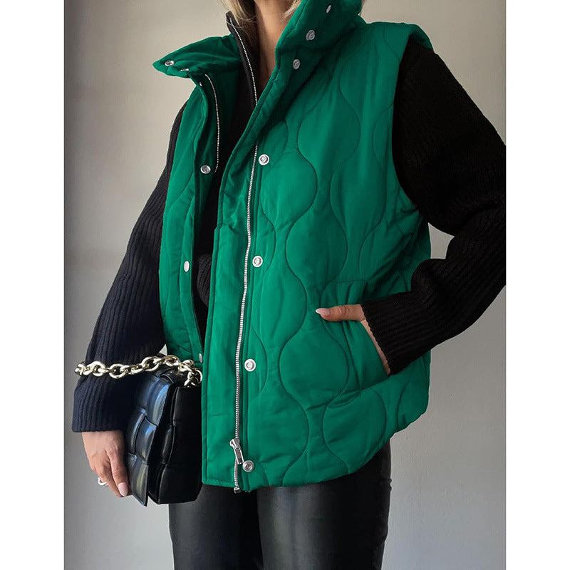 Quilted vest for women with high collar and practical pockets Lune London