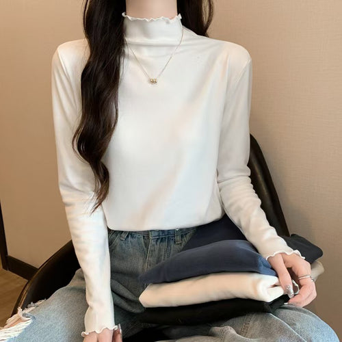 Chemise à manches longues pour femme avec col montant sophistiqué et volants