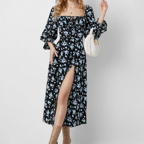 Robe midi pour femmes avec un design floral ludique et une fente haute Chic & Stil
