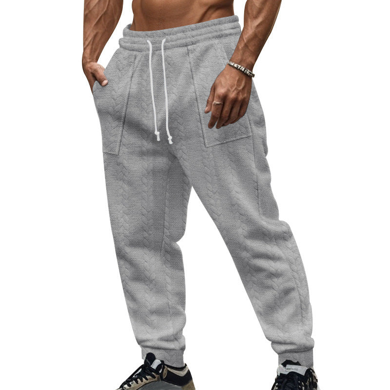 Men's leisure pants made of textured fleece with practical side pockets Lune London