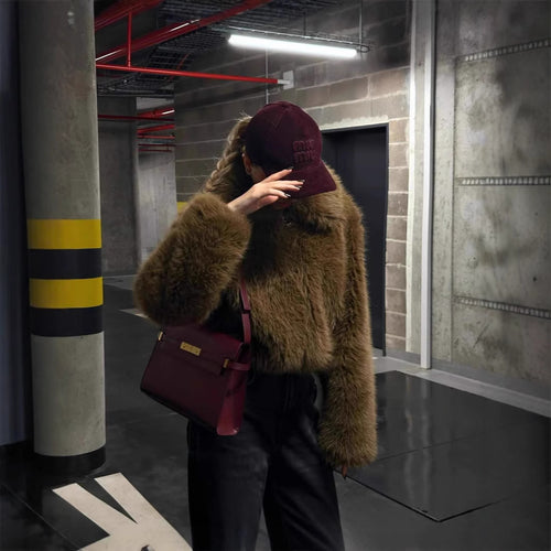Fashion faux fur jacket for women with a short cut and voluminous sleeves Amarae
