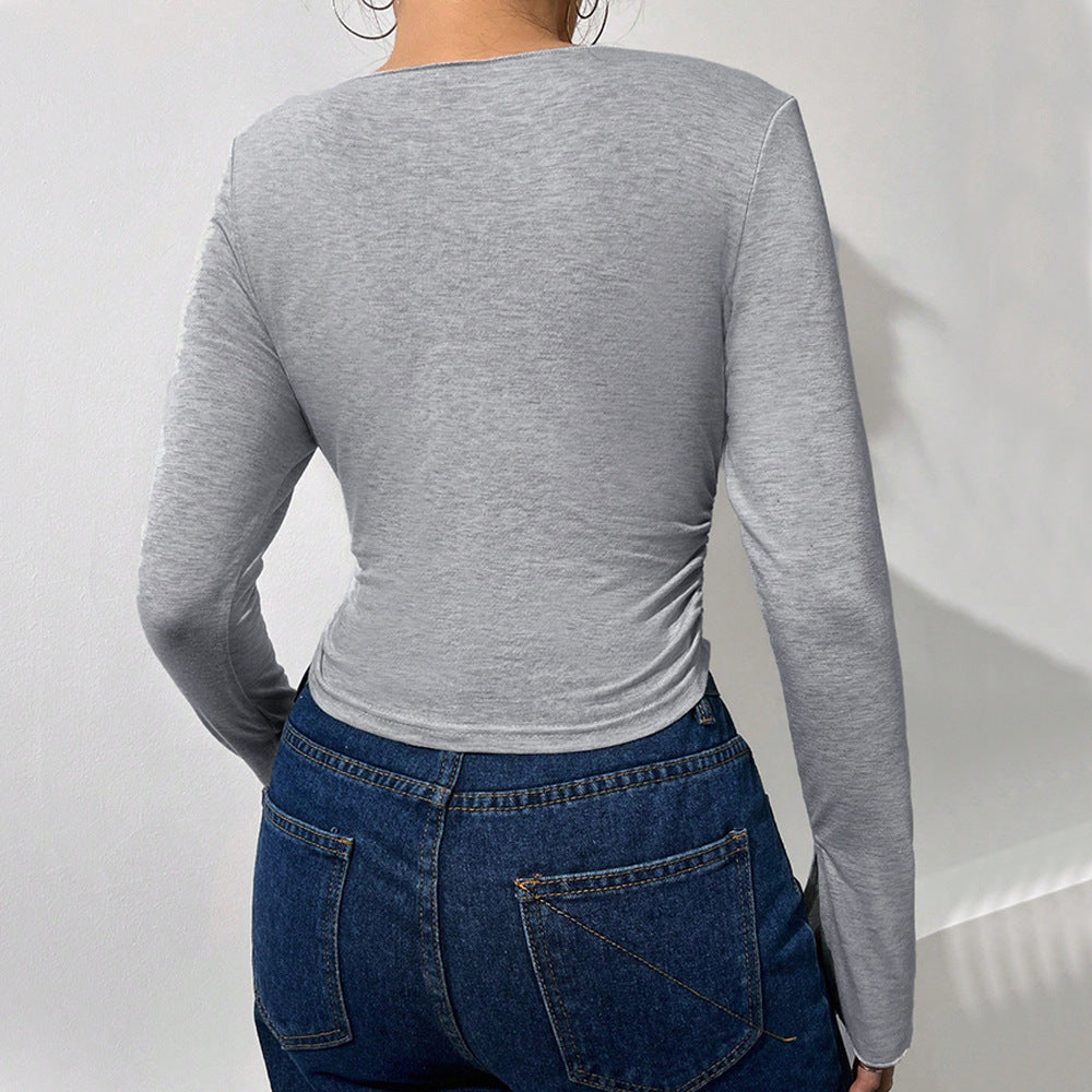 Chemise à manches longues cropped pour femmes avec des manches évasées à la mode et un élégant col en V Chic & Stil