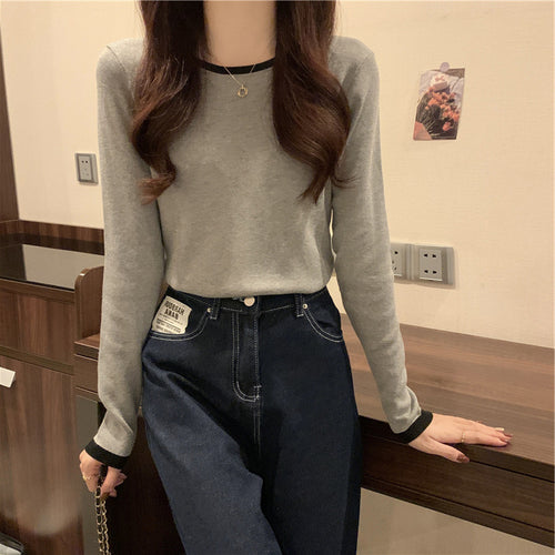 Women's long sleeve top with elegant contrasting collar and figure-flattering cut