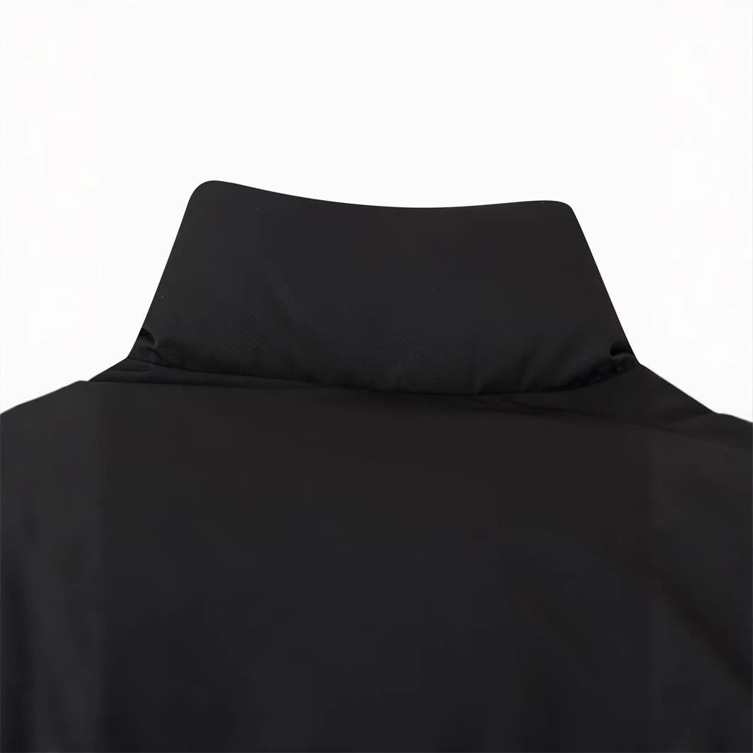Short quilted jacket for women with high collar and modern details Lune London