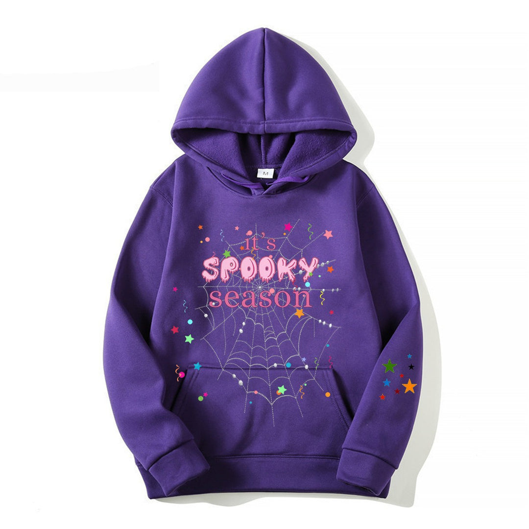 Women cozy hoodie with graphic Halloween design Chic & Stil