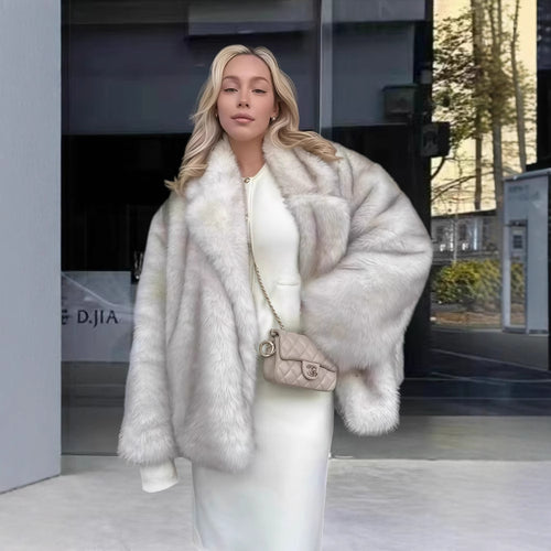 Ladies Elegant Synthetic Fur Jacket with Chic Sparkling Accents and Style