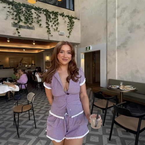 Women's pajama set with ruffle details and button-up top Amarae
