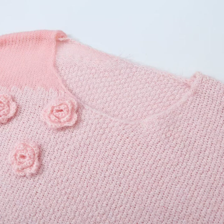 Women's knit set with cozy sweater featuring 3D flower appliqué and A-line skirt Amarae