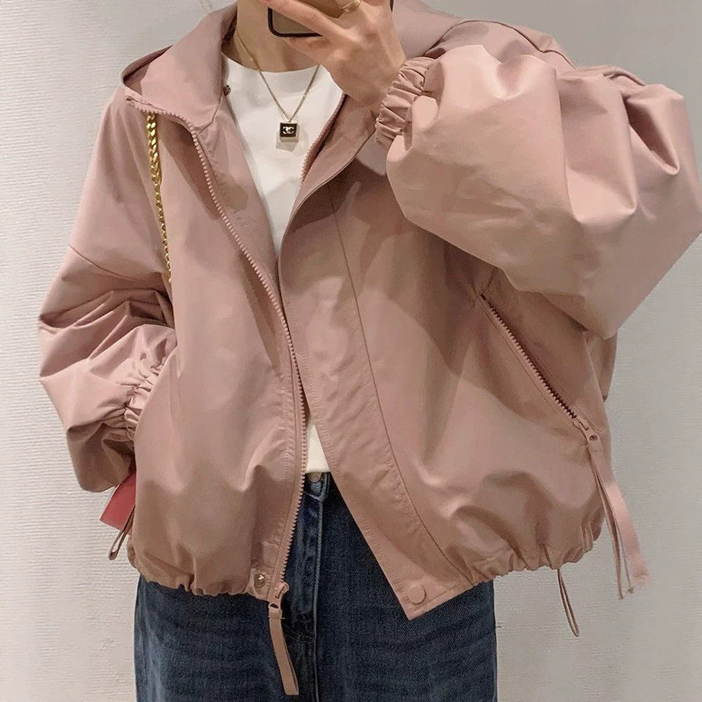 Women's oversized bomber-style hooded jacket with drawstring, elastic cuffs, and side zip pockets Amarae