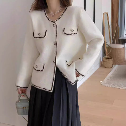 Ladies elegant knitted jacket with contrasting seams and pockets Amarae