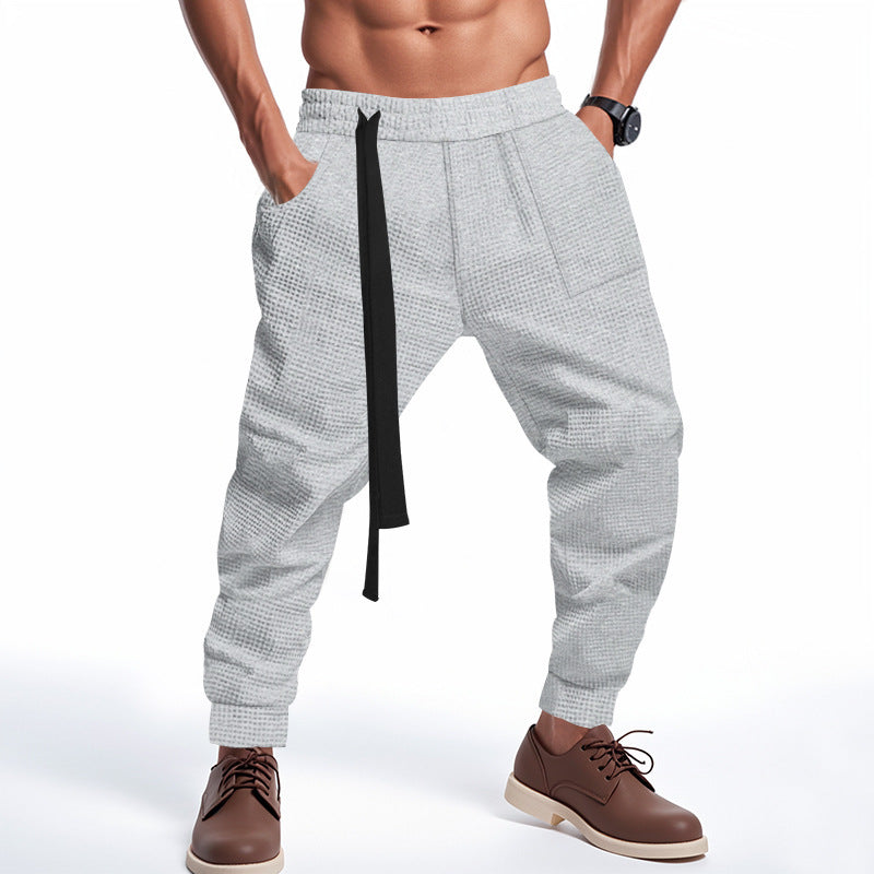 Men's casual fabric trousers with functional pockets and practical drawstring Chic and style
