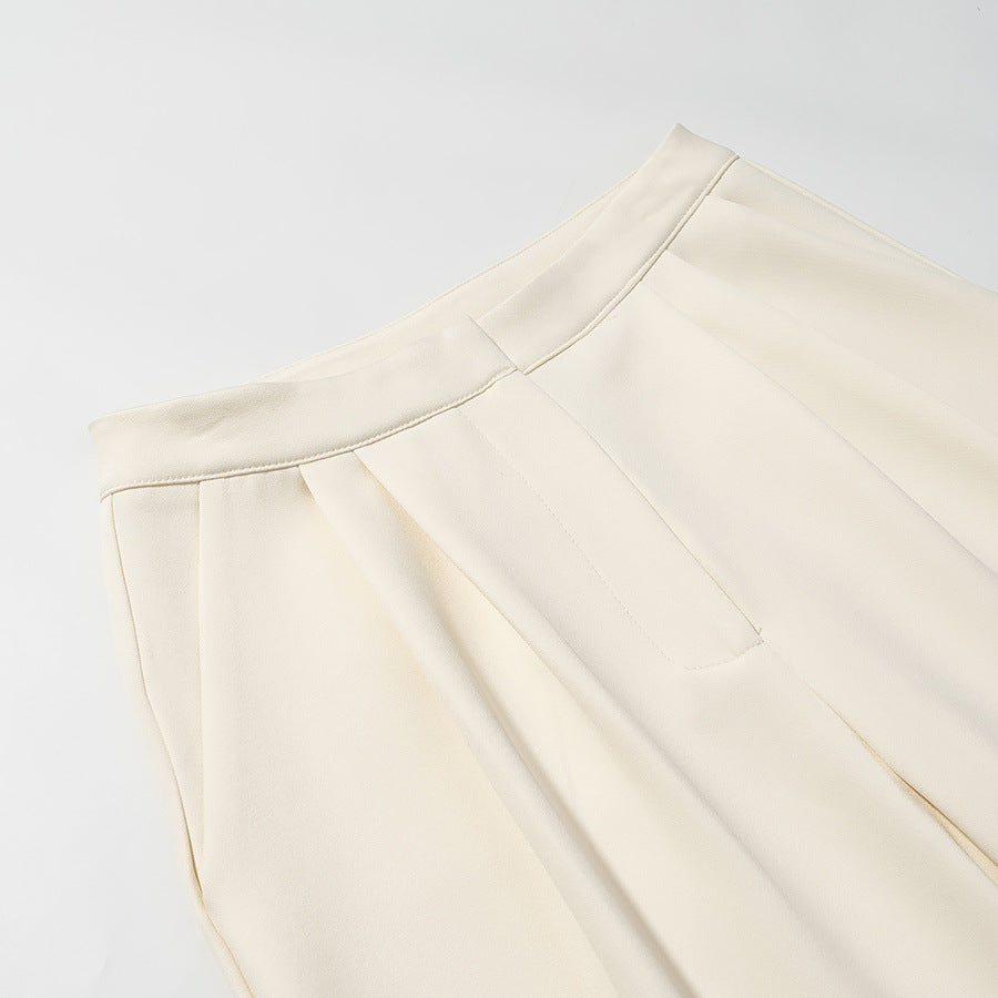 Women's high-waisted wide trousers with pleats, crease and side pockets Amarae