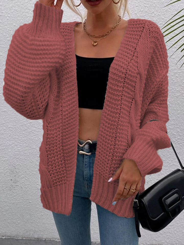 Ladies long sleeve knitted vest with a relaxed fit and large pockets Lune London
