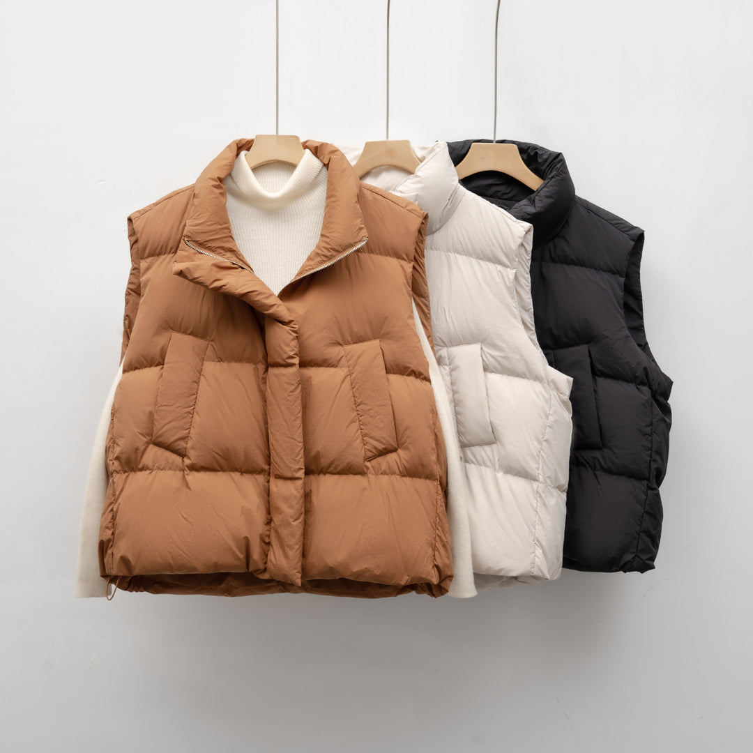Women's down vest with high collar and practical pockets Amarae