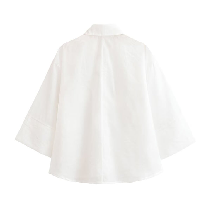 Women's blouse with three-quarter sleeves and three-dimensional flower appliqués Amarae