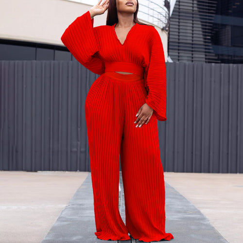 Puffed sleeve pleated jumpsuit for women with a fitted silhouette Amarae