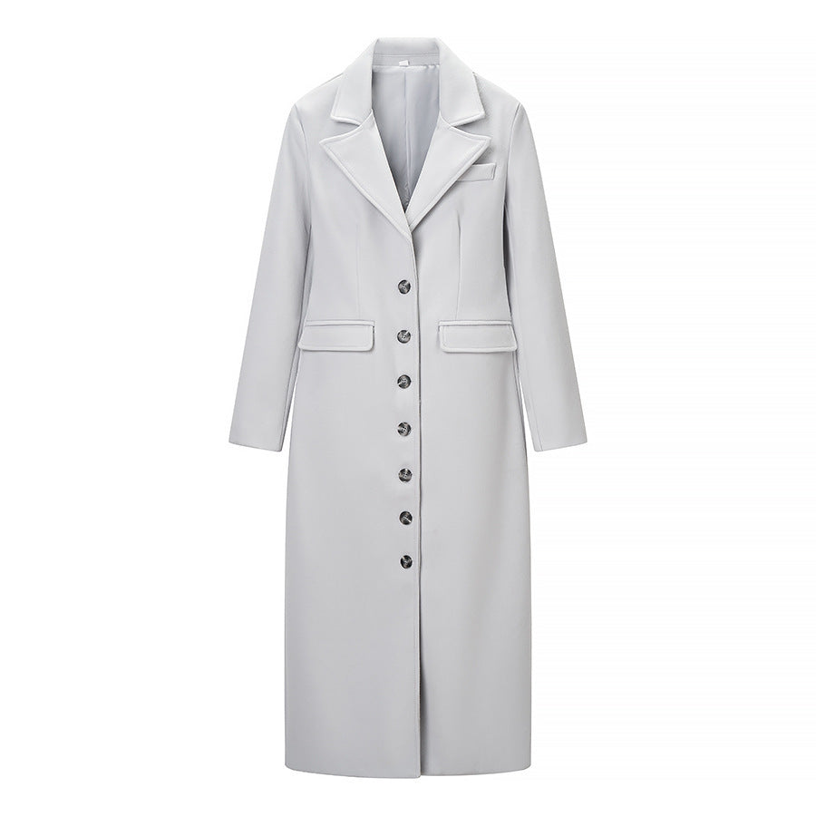 Manteau trench élégant pour femme au design minimaliste avec poches pratiques Chic & Stil