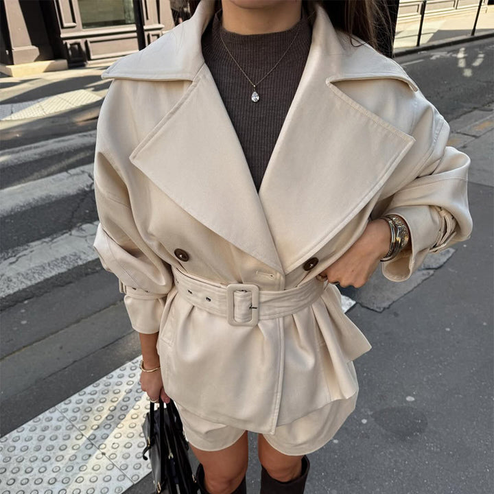 Ladies short trench coat with tailored belt, wide lapels and boxy silhouette Amarae