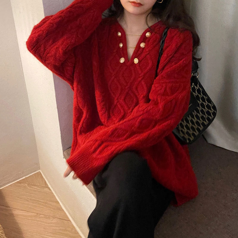 Pull ample en tricot pour dames avec détails en boutons et motif en maille torsadée Chic & Stil