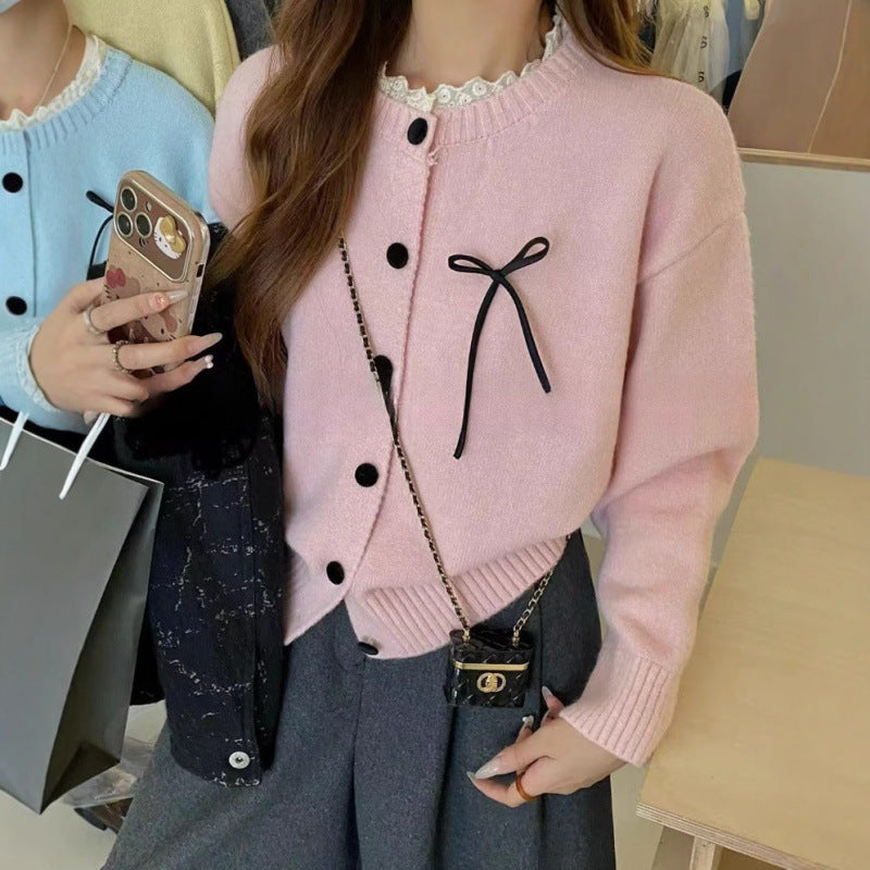 Knit cardigan for women with decorative buttons and a bow accent Lune London