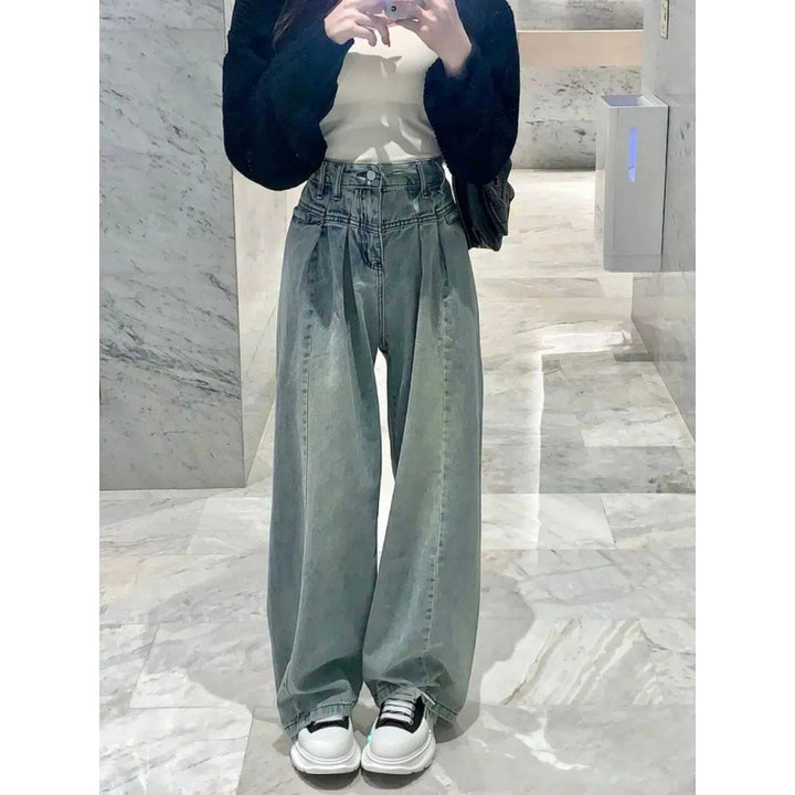 Jeans femmes taille haute à coupe large avec un design de ceinture élégant Chic & Stil