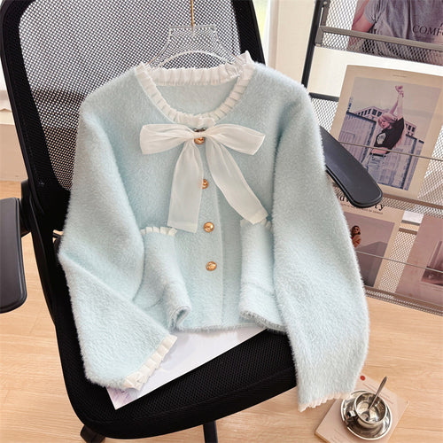 Cardigan Fluffy pour Femmes avec Col en Nœud Élegant et Boutons Décoratifs Chic & Stil