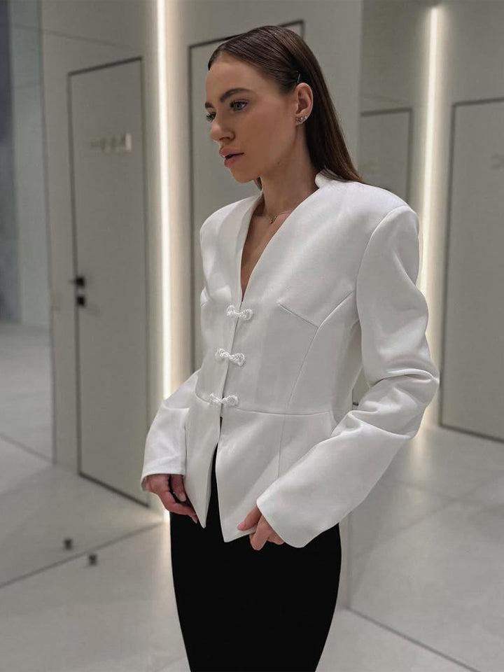 Women's peplum blazer with mandarin-like neckline and decorative knot fastenings Amarae