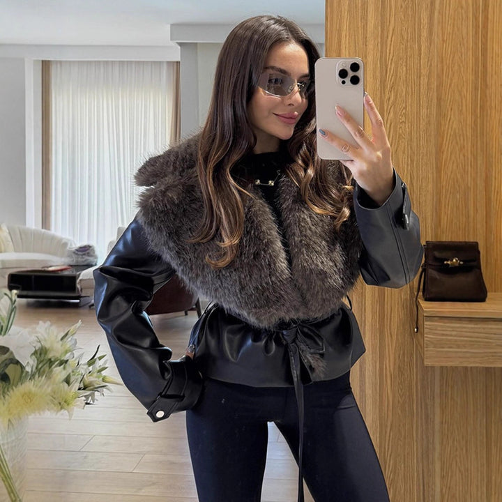 Women's short jacket in biker blouson style made of imitation leather with voluminous faux fur shawl collar and waist belt Amarae