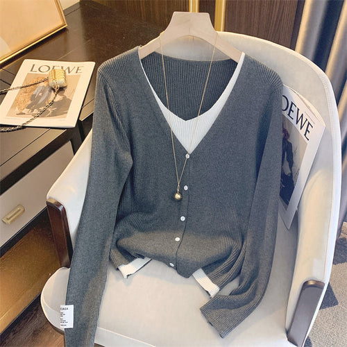 Casual knitted jacket for women with a fine ribbed structure and a deep V-neck Amarae