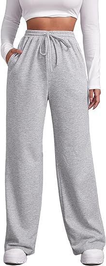Women's loose-fitting leisure pants with elastic waistband and side pockets Chic & Stil