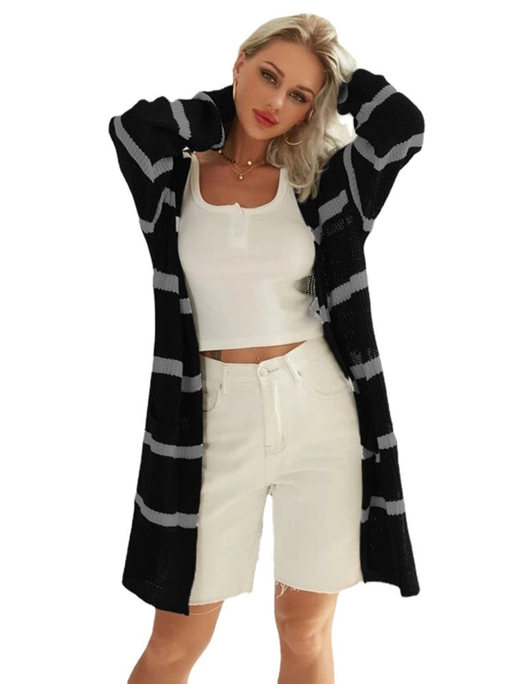 Knitted coat for women with a trendy layered look featuring a chic striped design