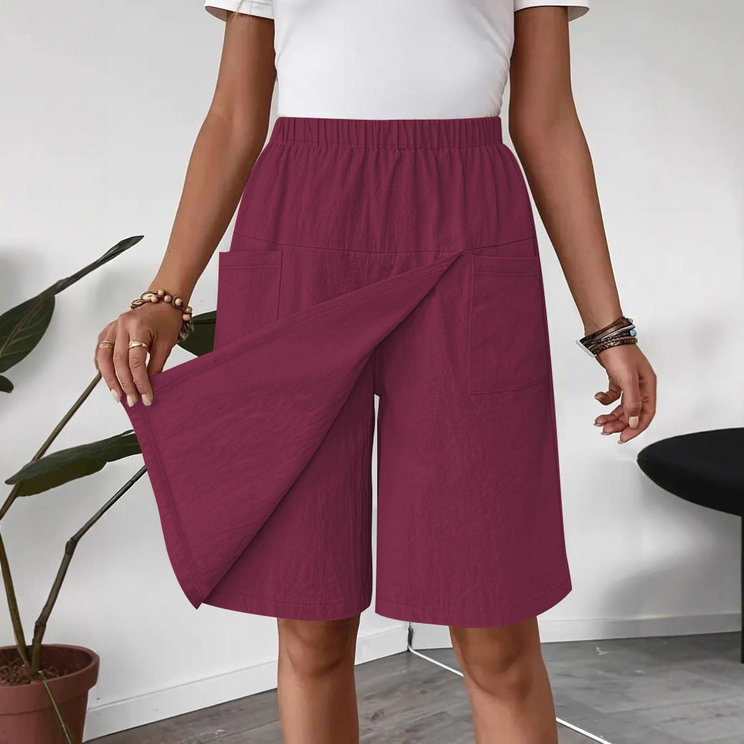 Mid-length wrap skirt for women with elastic waist and practical pockets Lune London
