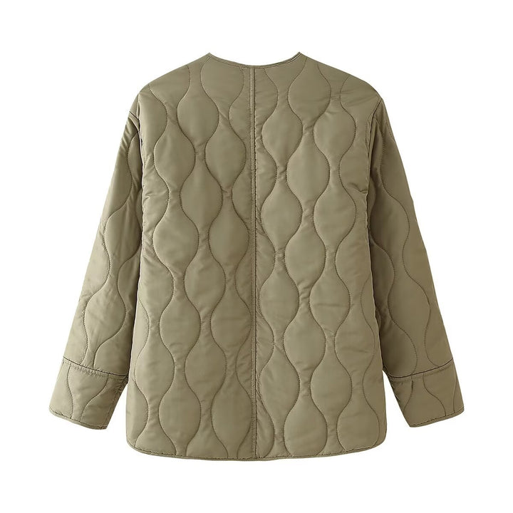 Quilted transitional jacket for women with high collar and practical pockets Lune London
