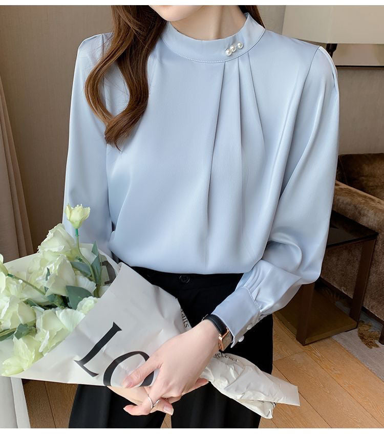 Blouse élégante pour femmes avec des détails en volants et un col stylé Chic & Stil