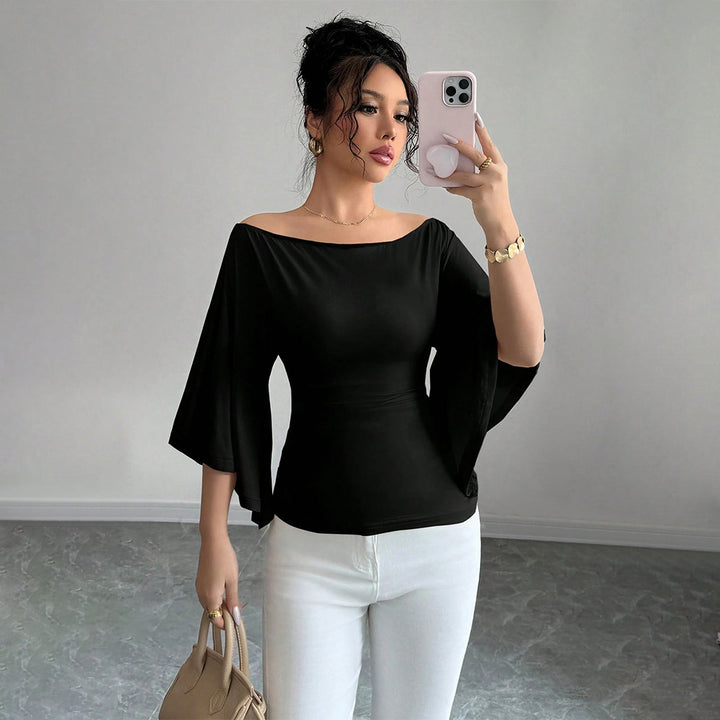 Haut élégant femme à épaules dénudées avec manches larges et coupe ajustée Chic & Stil