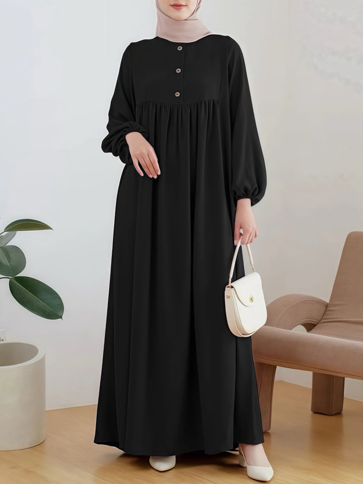 Lightweight maxi dress for women with comfortable buttoning and elegant puff sleeves Lune London