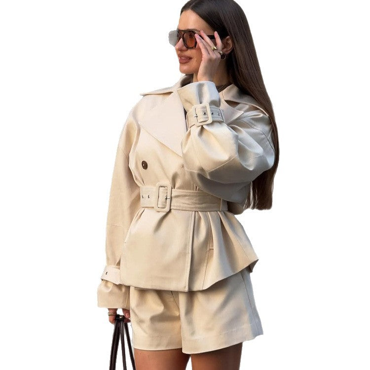 Ladies short trench coat with tailored belt, wide lapels and boxy silhouette Amarae