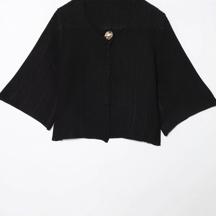 Ladies Elegant Cocoon Jacket with Chic Button Detail and Style