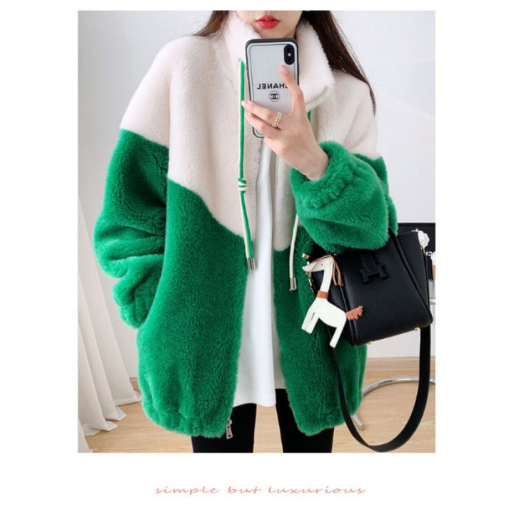Women’s plush jacket with high closing collar and practical zippered pockets Chic & Stil
