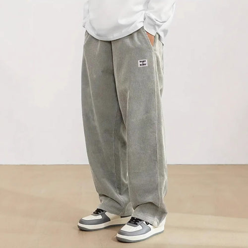 Women's wide corduroy trousers with elastic waistband and side pockets Chic & Stil