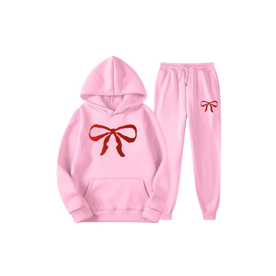 Women's hooded sweat suit with creative bow motif and comfortable fit Chic & Stil