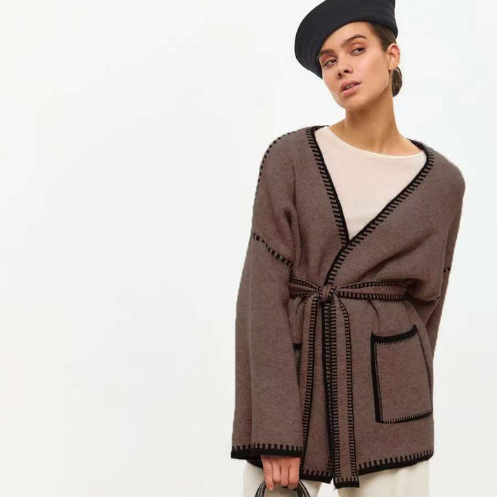 Thick knitted coat for women with practical belt and pockets Lune London