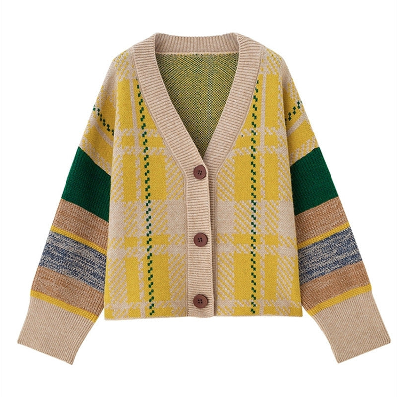 Ladies oversized knitted sweater with colorful checked pattern and large wooden buttons Lune London