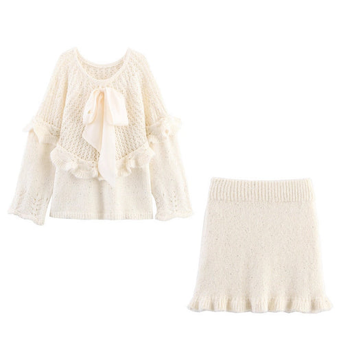 Elegant ladies knitted outfit with ruffles and bow accents Amarae
