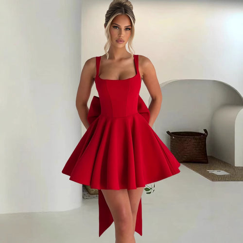 Women's cocktail dress with oversized bow design and flowing skirt Amarae