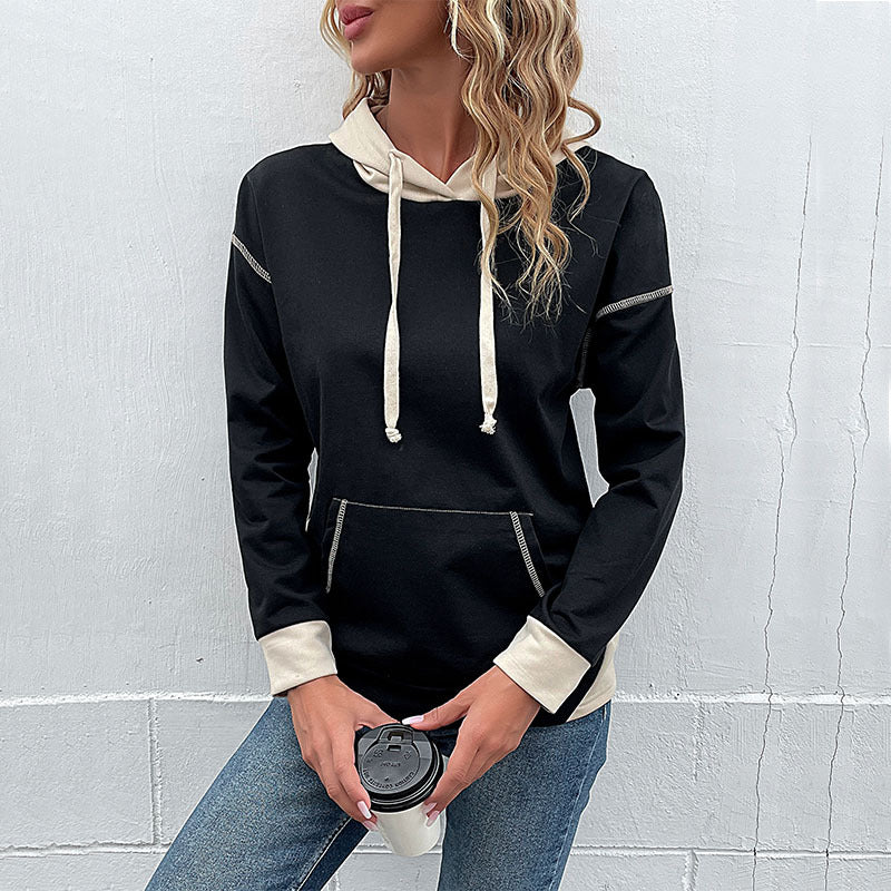 Casual hooded sweater for ladies with practical kangaroo pocket design Lune London