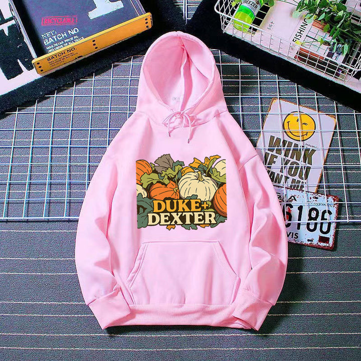 Women's hoodie with cheerful pumpkin motif Chic & Stil