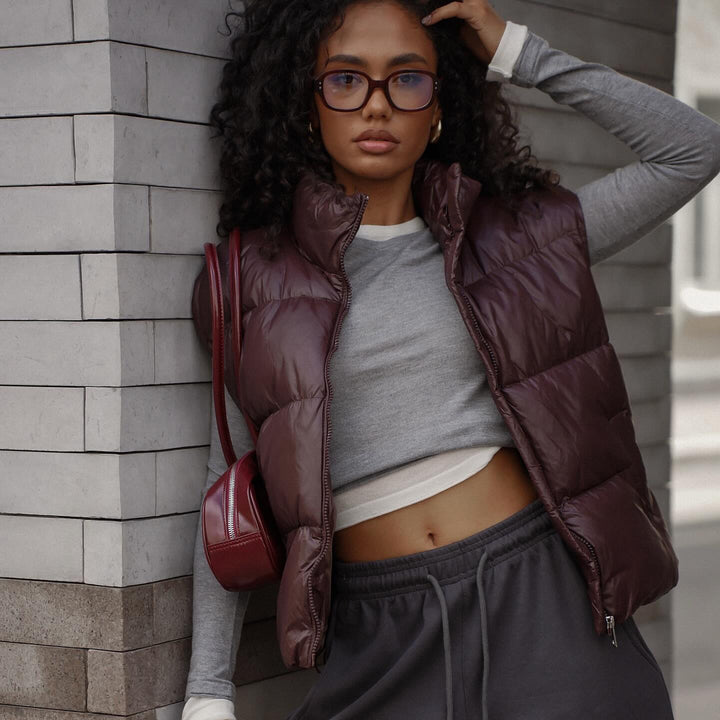 Quilted women's vest with high collar and practical zipper Amarae