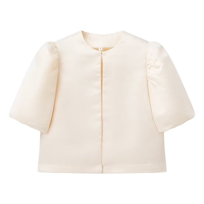 Veste élégante pour femmes avec des manches bouffantes et une coupe courte Chic & Stil