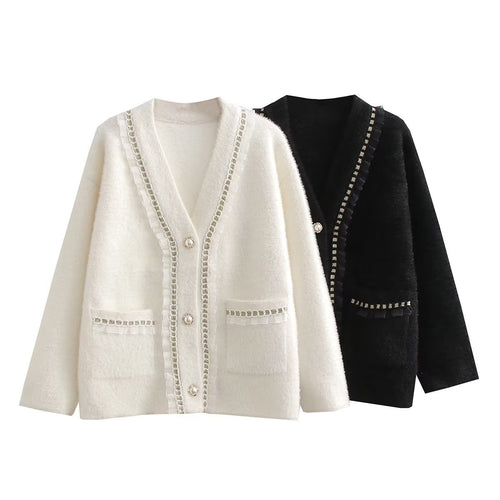 Fashionable women's knitted jacket with decorative ruffles and button details adorned with pearls Amarae